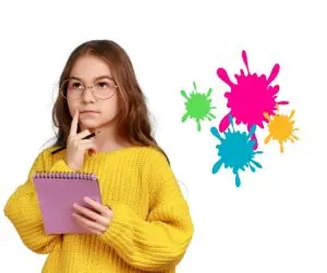 ילדה חושבת עם צבעים בצד